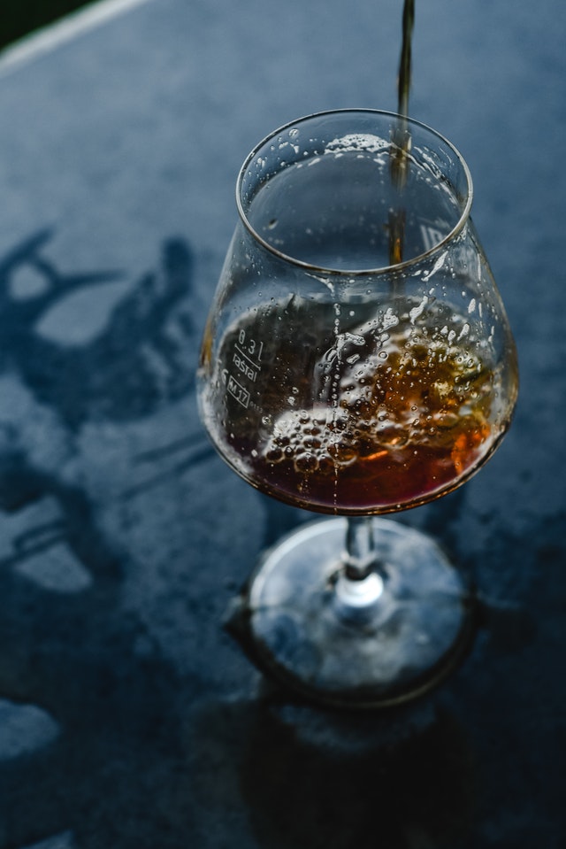 na beer being poured into a glass