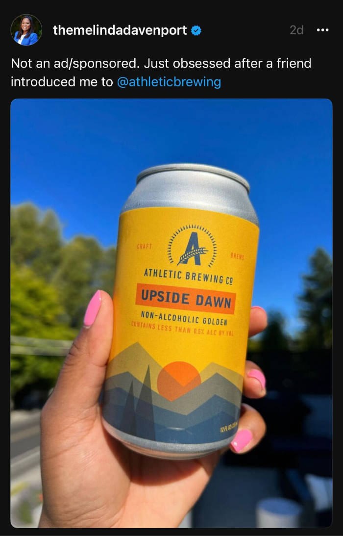 Melinda Davenport post on Threads about Athletic Brewing Upside Dawn non-alcoholic beer