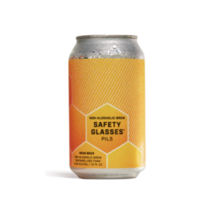 can of safety glasses pilsner non alcoholic beer by industrial arts brewing