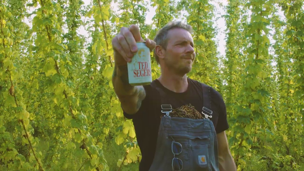 Dax Shepard drinking a non-alcoholic Ted Segers