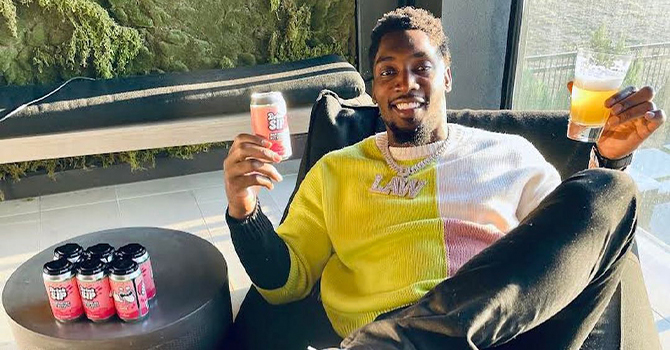 Demarcus Lawrence shows off his non-alcoholic beer brand, DrinkSip