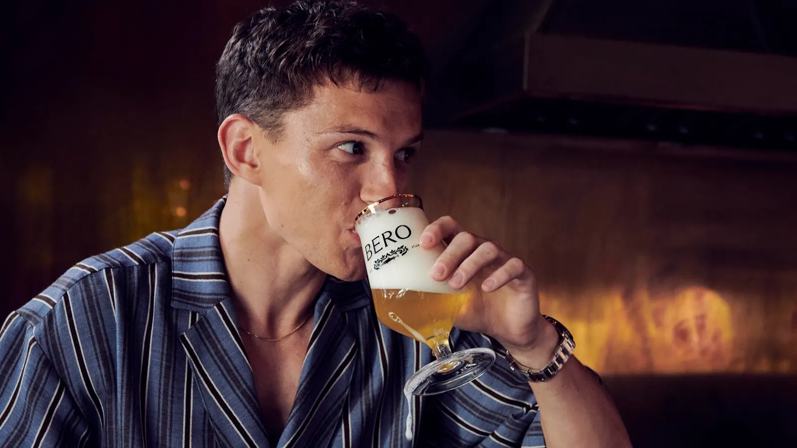 Tom Holland drinking a non-alcoholc BERO